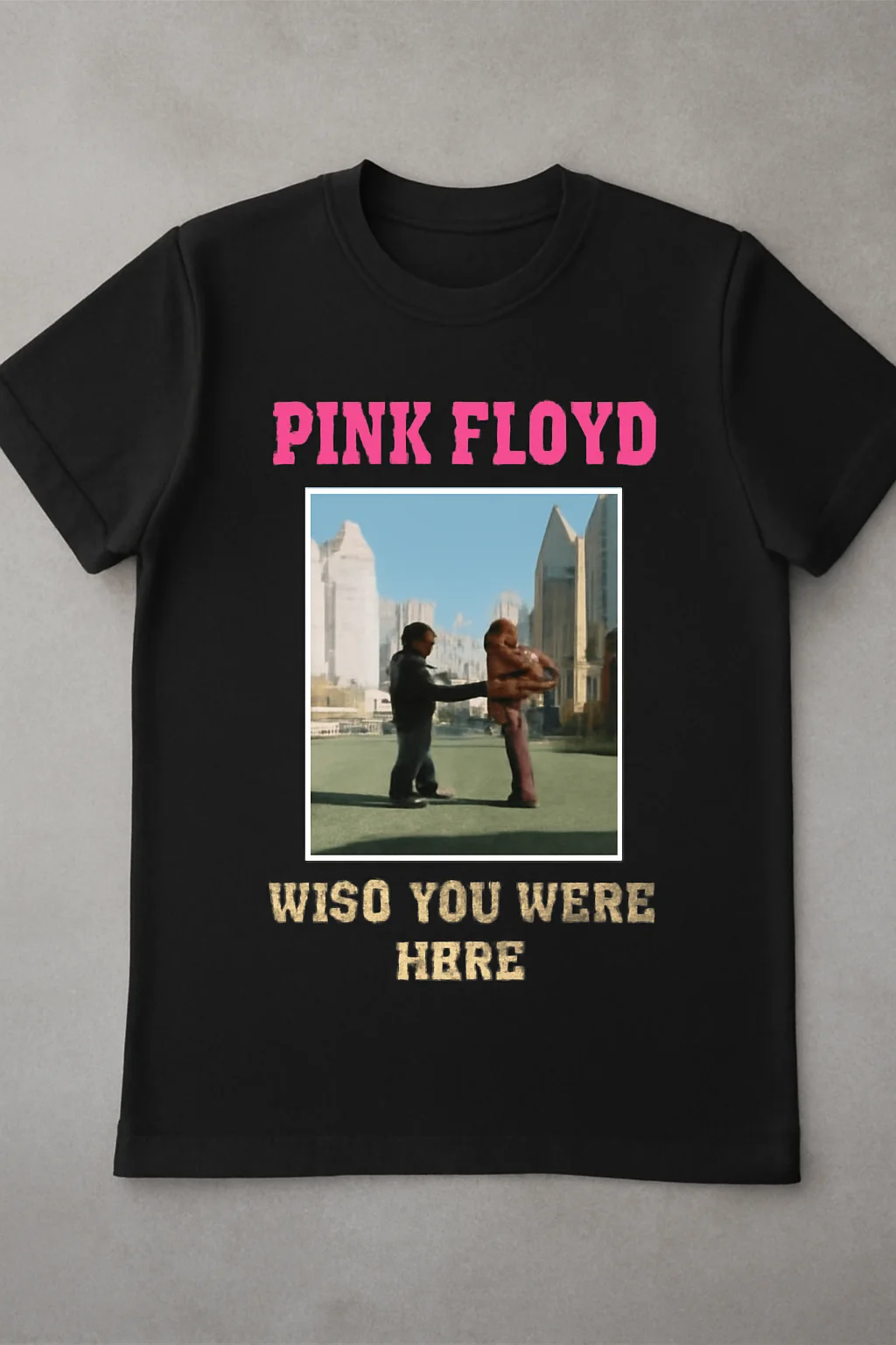 Folded Pink Floyd “Wish You Were Here” shirt with a blank gift tag.