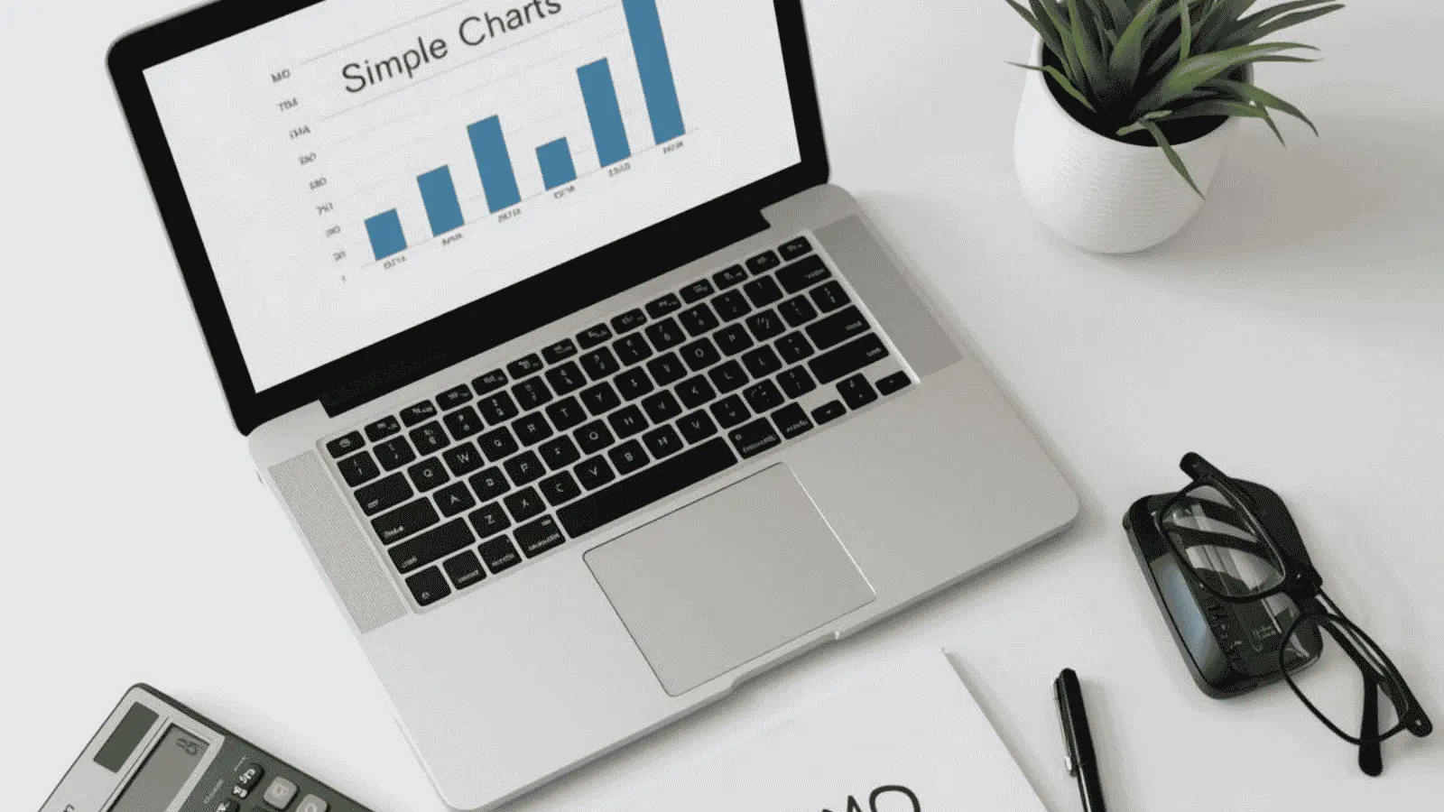 Workplace scene with tools for calculating and understanding the DPMO quality metric.